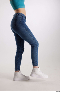 Rada  1 blue jeans casual dressed flexing leg side…